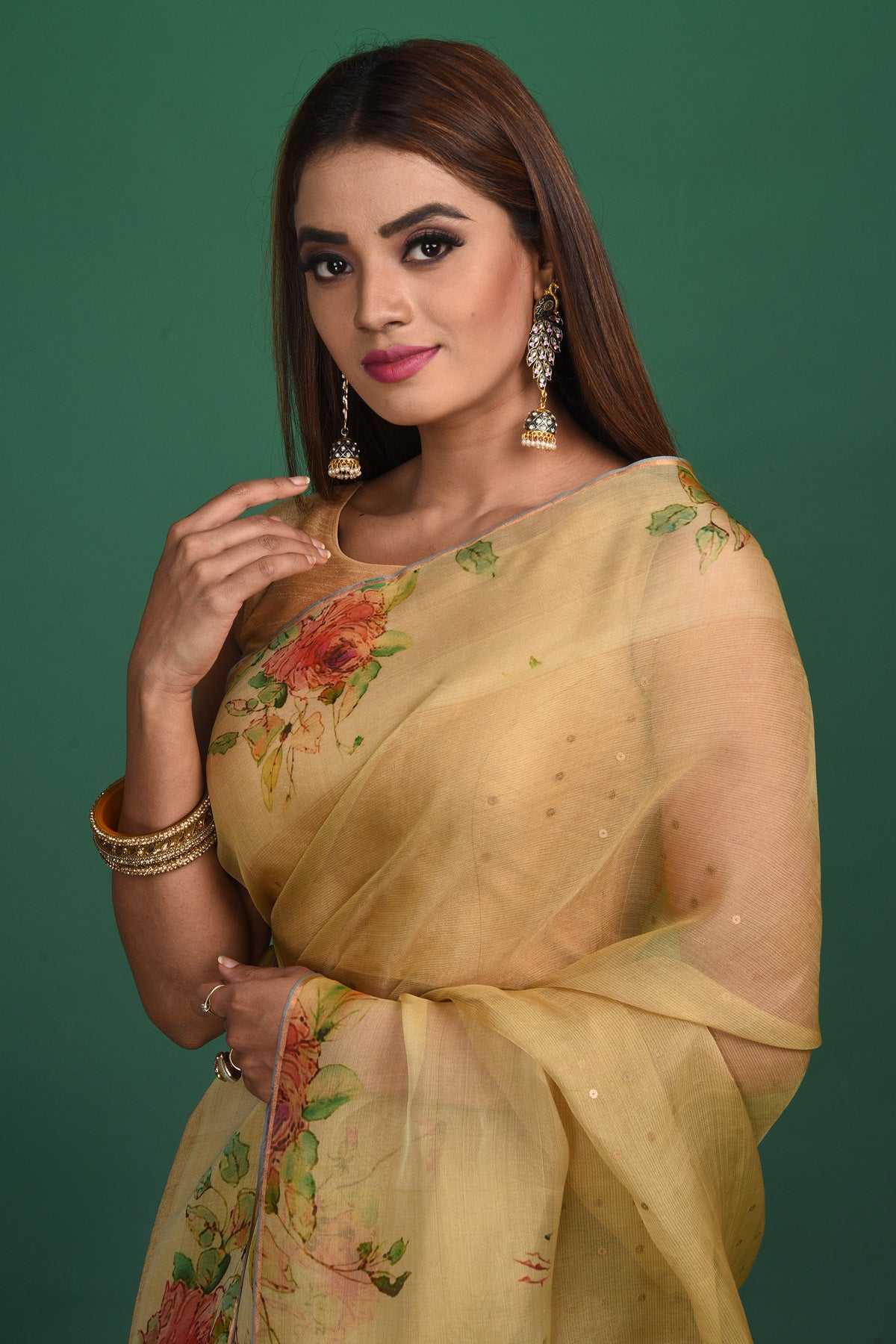 Buy this royal handcrafted weaving saree in cotton silk in light yellow color online in USA. It also has a Pallu with bronze weave and fringes. The entire saree has a Golden border and enhance with a beautiful floral pattern.  Make it yours and flaunt a handwoven marvel with minimal jewellery for a casual day outfit. Add this coton silk saree to your collection from Pure Elegance Indian fashion store in USA.-Close up.