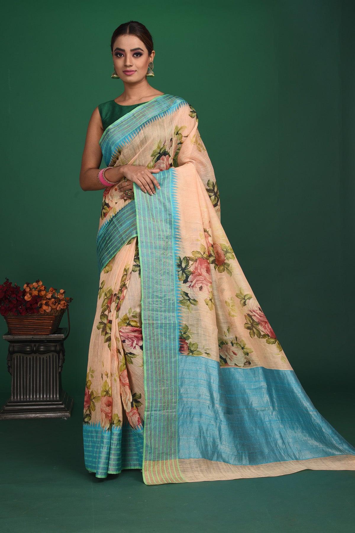 Shop this elegant peach-blue tussars silk saree with floral printed online in USA. This tussar handwoven silk saree will make you look stunningly beautiful. Embellished with a royal pallu and a unstitched blouse. Make it yours and flaunt a handwoven marvel. Add this designer saree from Pure Elegance Indian fashion store in USA.-Full view with open pallu.