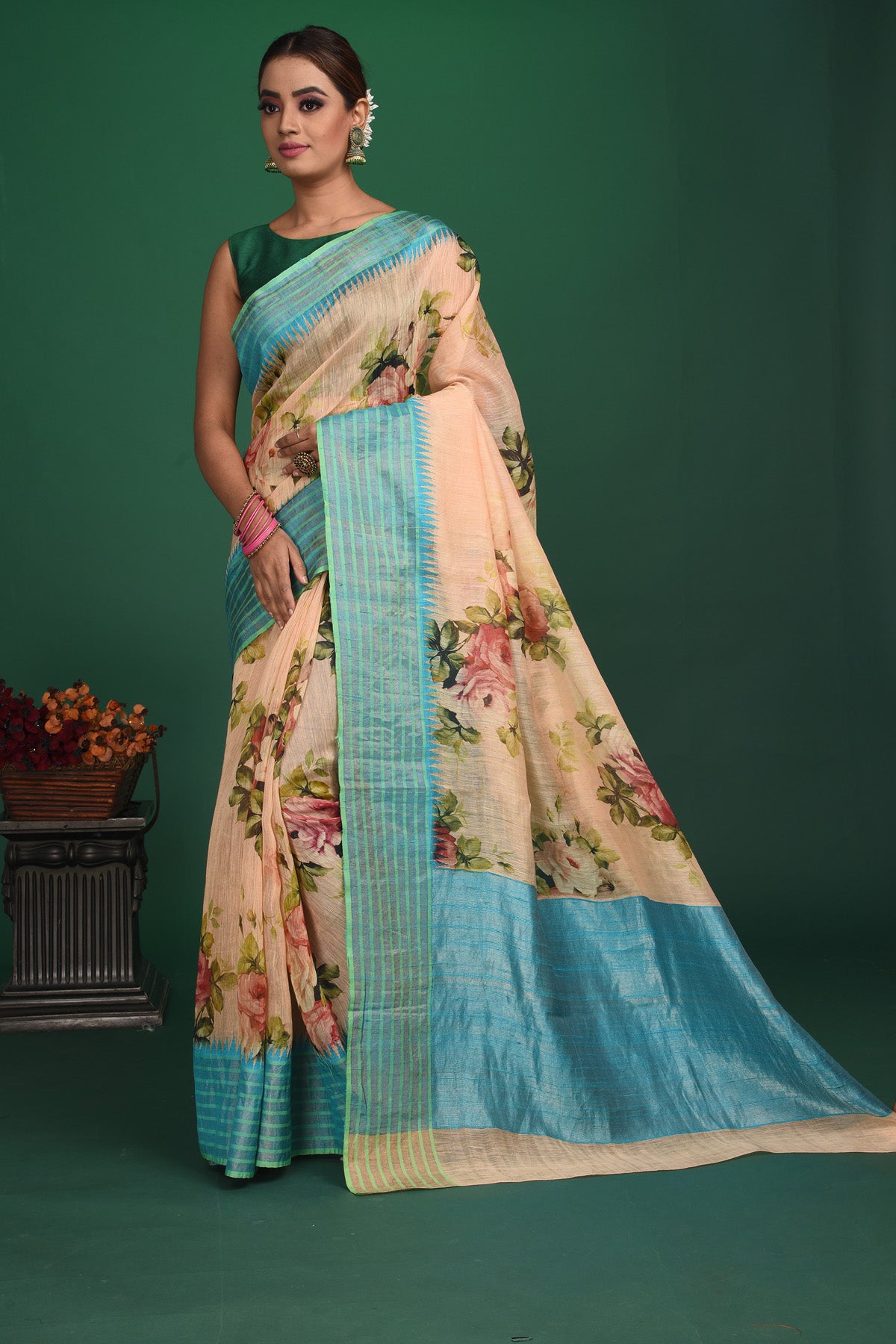 Shop this elegant peach-blue tussars silk saree with floral printed online in USA. This tussar handwoven silk saree will make you look stunningly beautiful. Embellished with a royal pallu and a unstitched blouse. Make it yours and flaunt a handwoven marvel. Add this designer saree from Pure Elegance Indian fashion store in USA.-Full view.