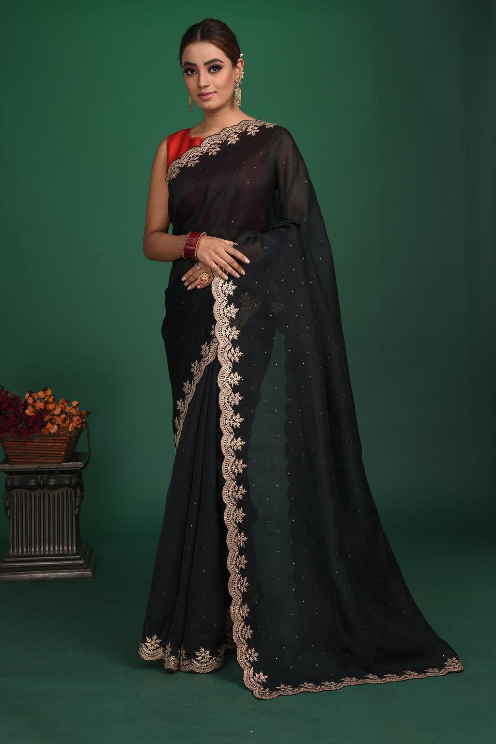 Buy this exquisite black saree in soft organza with heavy lace border online in USA which is made of organza fabric and lightweight. This organza Saree is beautified with lace work and latest trend. Ideal for casual, kitty parties, stylish accessories. Shop this from Pure Elegance Indian fashion store in USA.-Full view with open pallu.