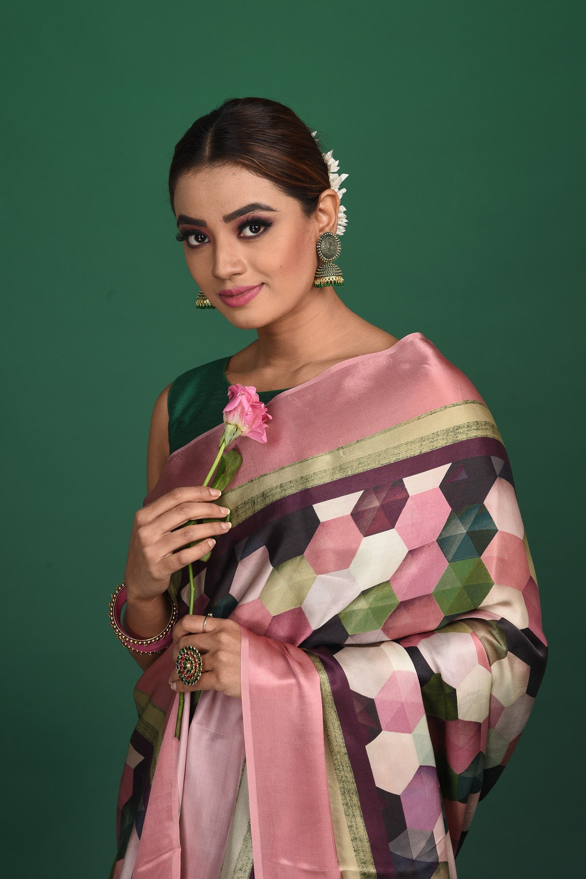 Shop elegant dusty pink and black printed crepe satin saree online in USA. Be a vision of style and elegance at parties and special occasions in beautiful designer sarees, embroidered sarees, printed sarees, satin saris from Pure Elegance Indian fashion store in USA.-closeup