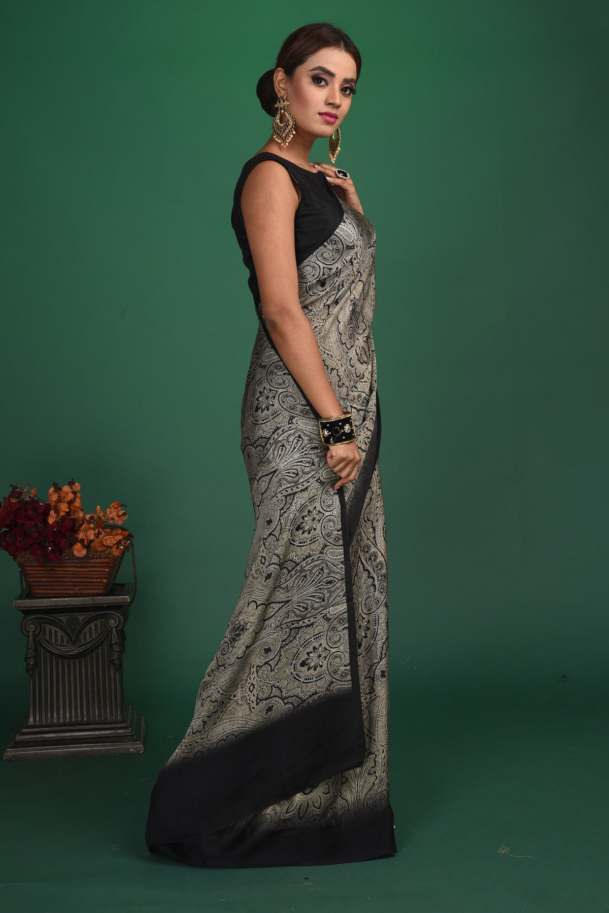 Shop stunning black and grey printed crepe satin saree online in USA. Be a vision of style and elegance at parties and special occasions in beautiful designer sarees, embroidered sarees, printed sarees, satin saris from Pure Elegance Indian fashion store in USA.-side