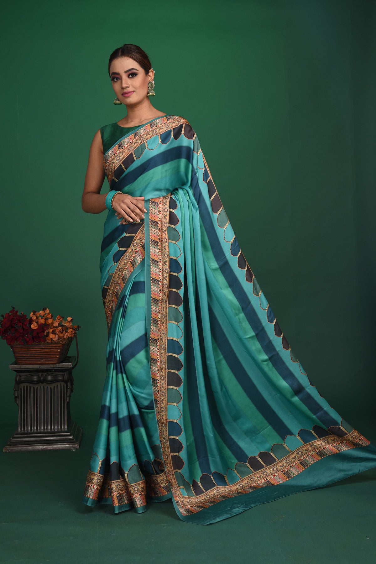 Shop stunning blue striped printed crepe satin saree online in USA. Be a vision of style and elegance at parties and special occasions in beautiful designer sarees, embroidered sarees, printed sarees, satin saris from Pure Elegance Indian fashion store in USA.-full view