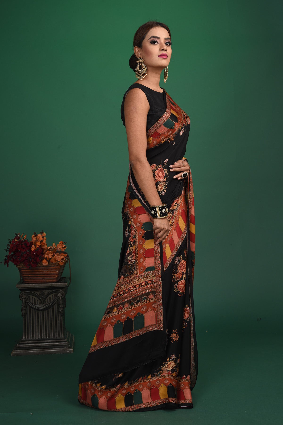 Shop stunning black floral printed crepe satin saree online in USA. Be a vision of style and elegance at parties and special occasions in beautiful designer sarees, embroidered sarees, printed sarees, satin saris from Pure Elegance Indian fashion store in USA.-side