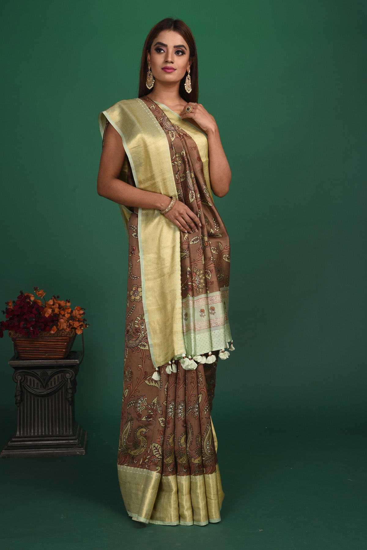 Shop beautiful brown printed tussar Banarasi saree online in USA with zari border. Be a vision of style and elegance at parties and special occasions in beautiful designer sarees, embroidered sarees, printed sarees, satin saris from Pure Elegance Indian fashion store in USA.-full view