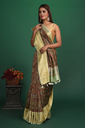 Shop beautiful brown printed tussar Banarasi saree online in USA with zari border. Be a vision of style and elegance at parties and special occasions in beautiful designer sarees, embroidered sarees, printed sarees, satin saris from Pure Elegance Indian fashion store in USA.-pallu