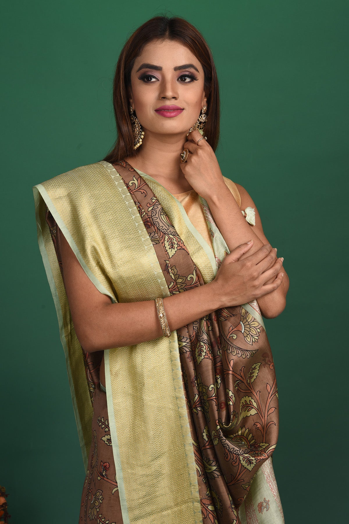 Shop beautiful brown printed tussar Banarasi saree online in USA with zari border. Be a vision of style and elegance at parties and special occasions in beautiful designer sarees, embroidered sarees, printed sarees, satin saris from Pure Elegance Indian fashion store in USA.-closeup