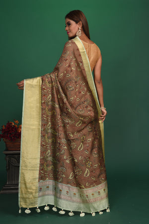 Shop beautiful brown printed tussar Banarasi saree online in USA with zari border. Be a vision of style and elegance at parties and special occasions in beautiful designer sarees, embroidered sarees, printed sarees, satin saris from Pure Elegance Indian fashion store in USA.-back