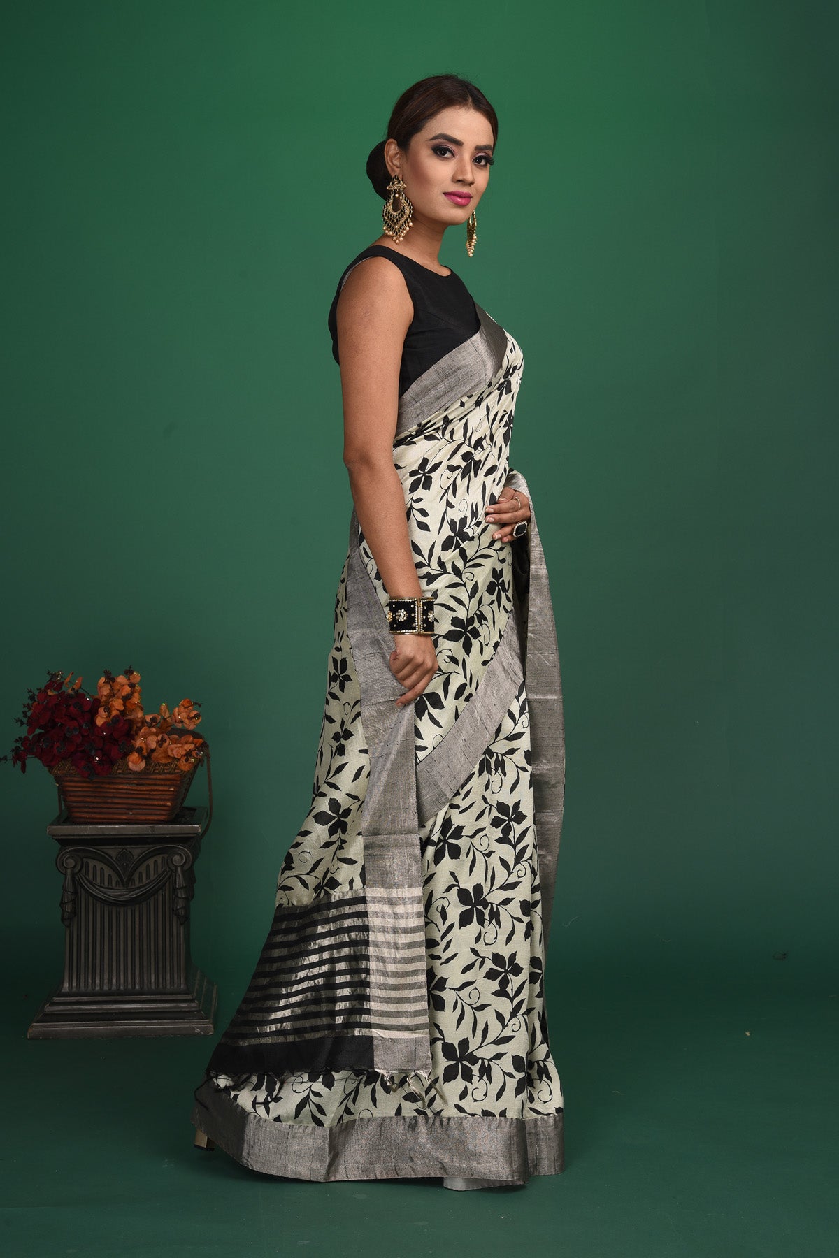Shop beautiful light grey floral print tussar Benarasi saree online in USA with zari border. Be a vision of style and elegance at parties and special occasions in beautiful designer sarees, embroidered sarees, printed sarees, satin saris from Pure Elegance Indian fashion store in USA.-side