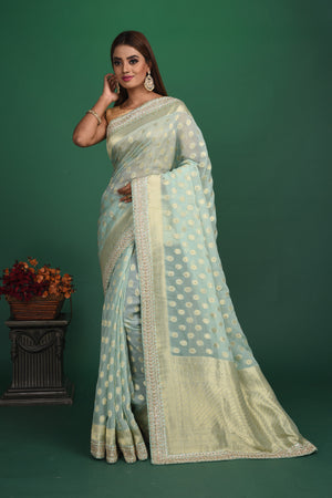 Buy stunning powder blue Benarasi georgette saree online in USA with embroidered border. Be a vision of style and elegance at parties and special occasions in beautiful designer sarees, embroidered sarees, printed sarees, satin saris from Pure Elegance Indian fashion store in USA.-pallu