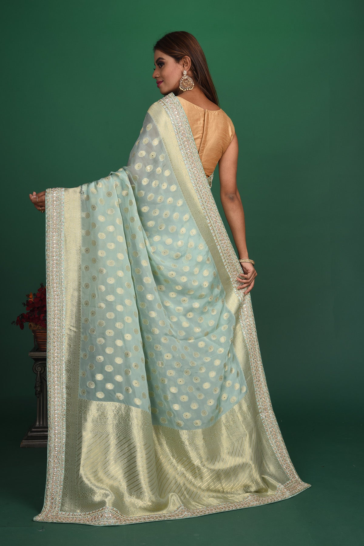 Buy stunning powder blue Benarasi georgette saree online in USA with embroidered border. Be a vision of style and elegance at parties and special occasions in beautiful designer sarees, embroidered sarees, printed sarees, satin saris from Pure Elegance Indian fashion store in USA.-back