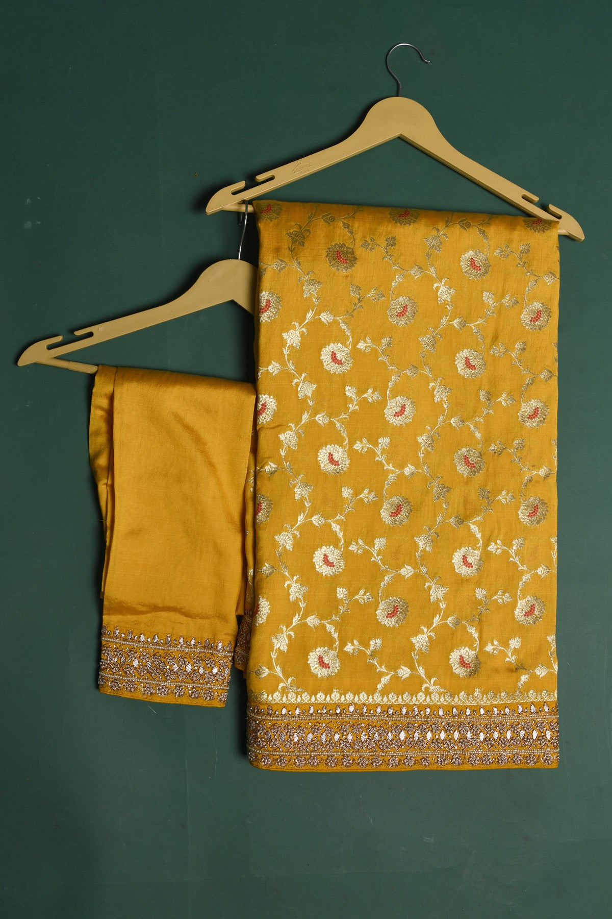 Buy stunning yellow Benarasi georgette saree online in USA with embroidered border. Be a vision of style and elegance at parties and special occasions in beautiful designer sarees, embroidered sarees, printed sarees, satin saris from Pure Elegance Indian fashion store in USA.-blouse