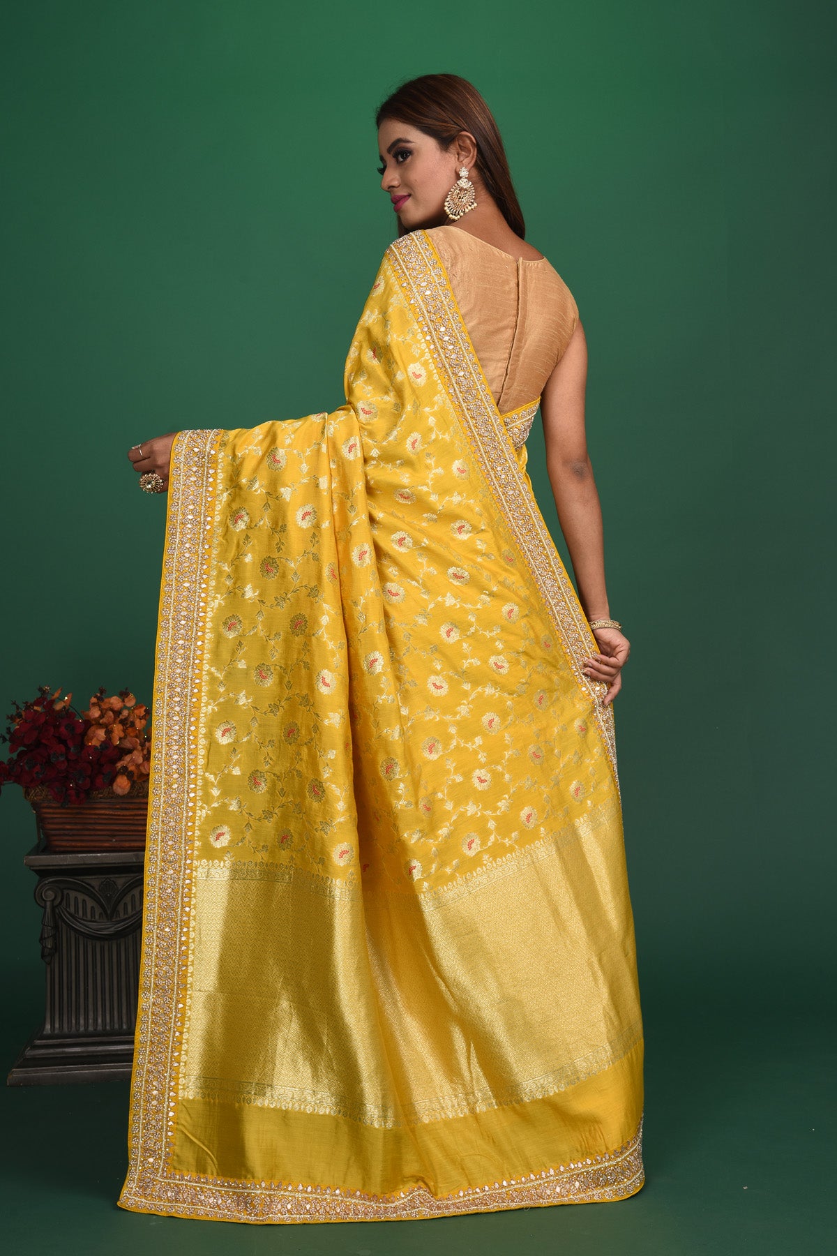 Buy stunning yellow Benarasi georgette saree online in USA with embroidered border. Be a vision of style and elegance at parties and special occasions in beautiful designer sarees, embroidered sarees, printed sarees, satin saris from Pure Elegance Indian fashion store in USA.-back
