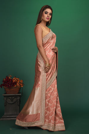 Buy stunning beige Benarasi saree online in USA with embroidered border. Be a vision of style and elegance at parties and special occasions in beautiful designer sarees, embroidered sarees, printed sarees, satin saris from Pure Elegance Indian fashion store in USA.-side