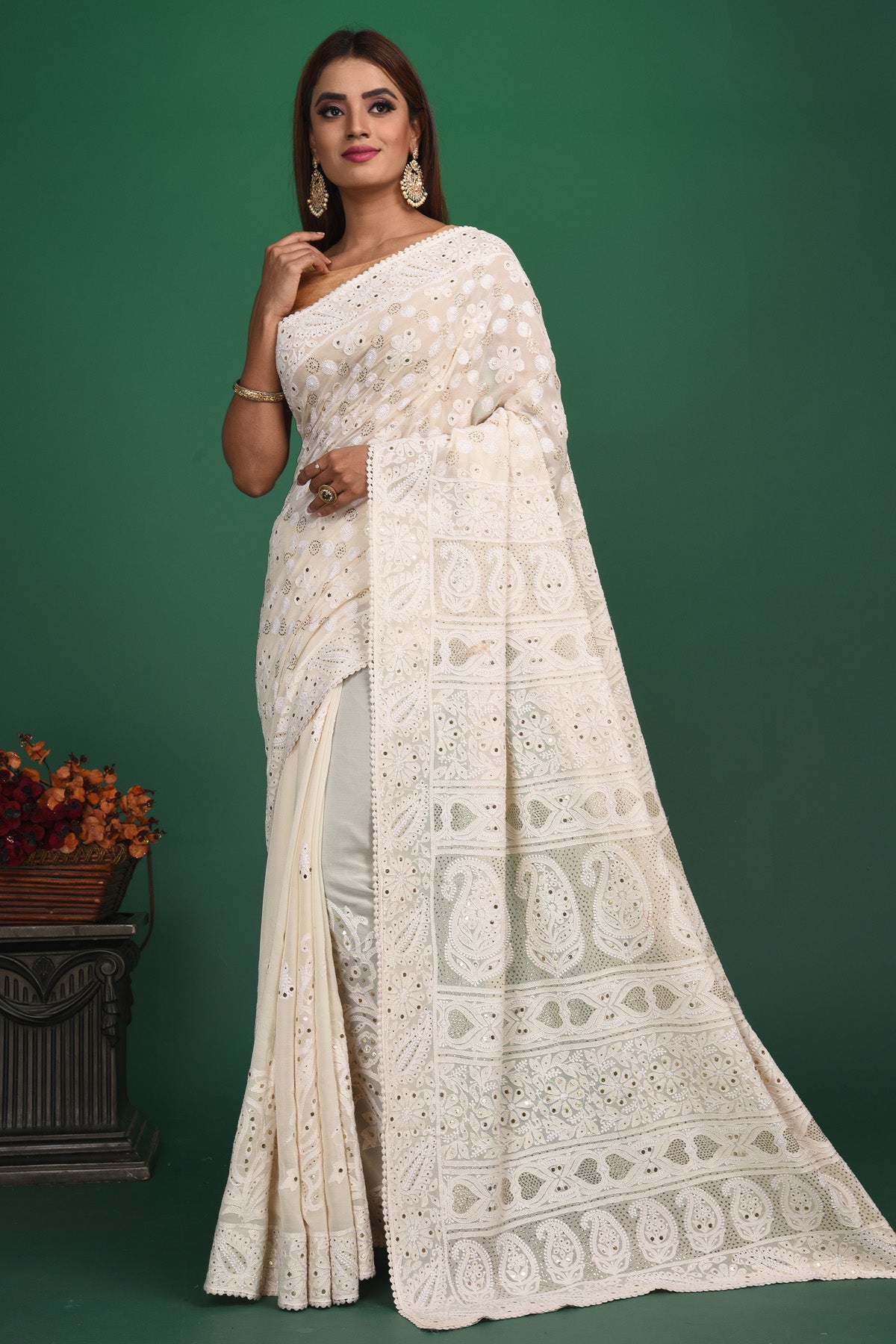 Buy beautiful cream Lucknowi georgette saree online in USA. Be a vision of style and elegance at parties and special occasions in beautiful designer sarees, embroidered sarees, printed sarees, satin saris from Pure Elegance Indian fashion store in USA.-full view