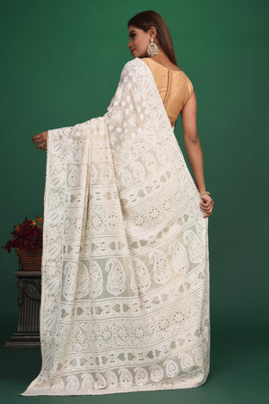 Buy beautiful cream Lucknowi georgette saree online in USA. Be a vision of style and elegance at parties and special occasions in beautiful designer sarees, embroidered sarees, printed sarees, satin saris from Pure Elegance Indian fashion store in USA.-back