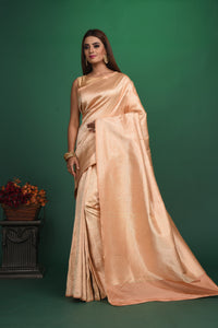 Shop stunning peach Banarasi saree online in USA with designer saree blouse. Be a vision of style and elegance at parties and special occasions in beautiful designer sarees, embroidered sarees, printed sarees, satin saris from Pure Elegance Indian fashion store in USA.-full view
