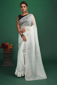 Shop beautiful powder blue embroidered organza saree online in USA with blouse. Be a vision of style and elegance at parties and special occasions in beautiful designer sarees, embroidered sarees, printed sarees, satin saris from Pure Elegance Indian fashion store in USA.-full view