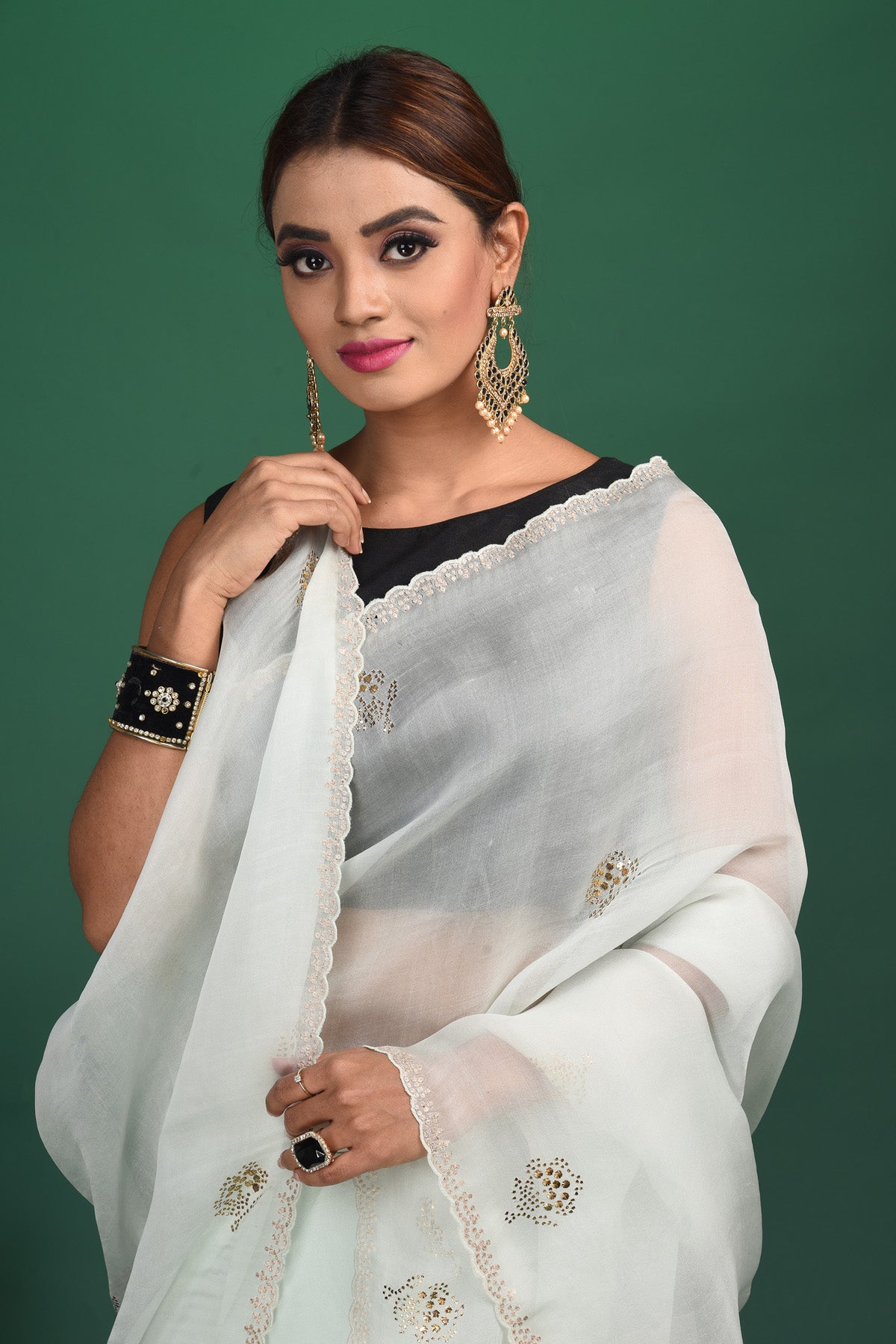 Shop beautiful powder blue embroidered organza saree online in USA with blouse. Be a vision of style and elegance at parties and special occasions in beautiful designer sarees, embroidered sarees, printed sarees, satin saris from Pure Elegance Indian fashion store in USA.-closeup