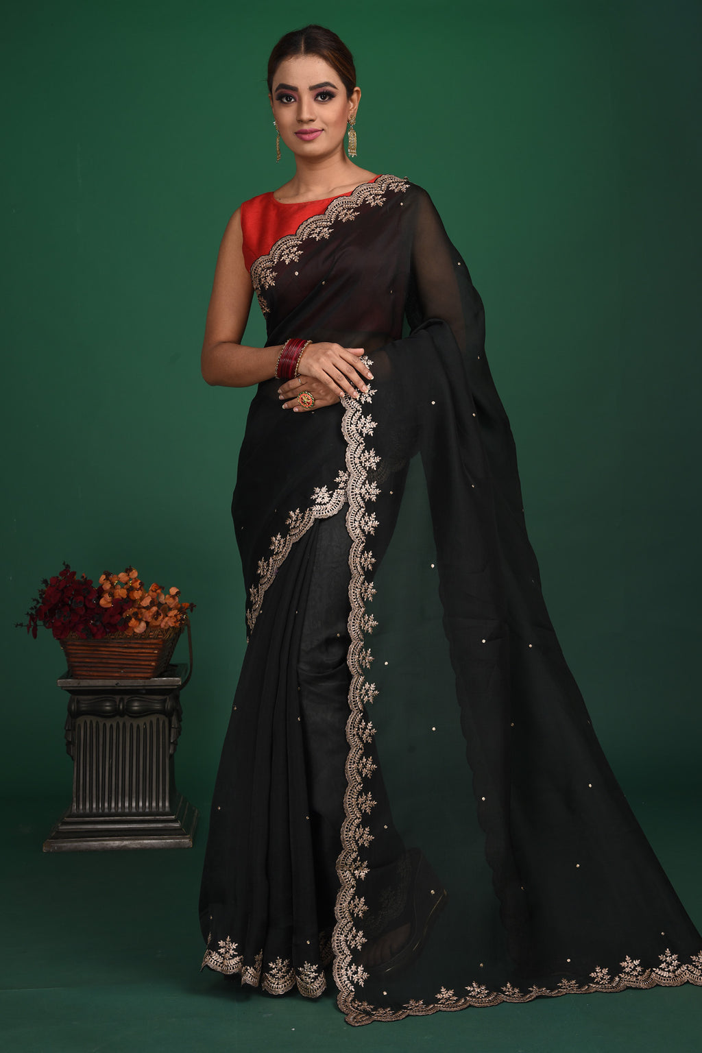 Shop beautiful black embroidered organza saree online in USA with designer blouse. Be a vision of style and elegance at parties and special occasions in beautiful designer sarees, embroidered sarees, printed sarees, satin saris from Pure Elegance Indian fashion store in USA.-full view