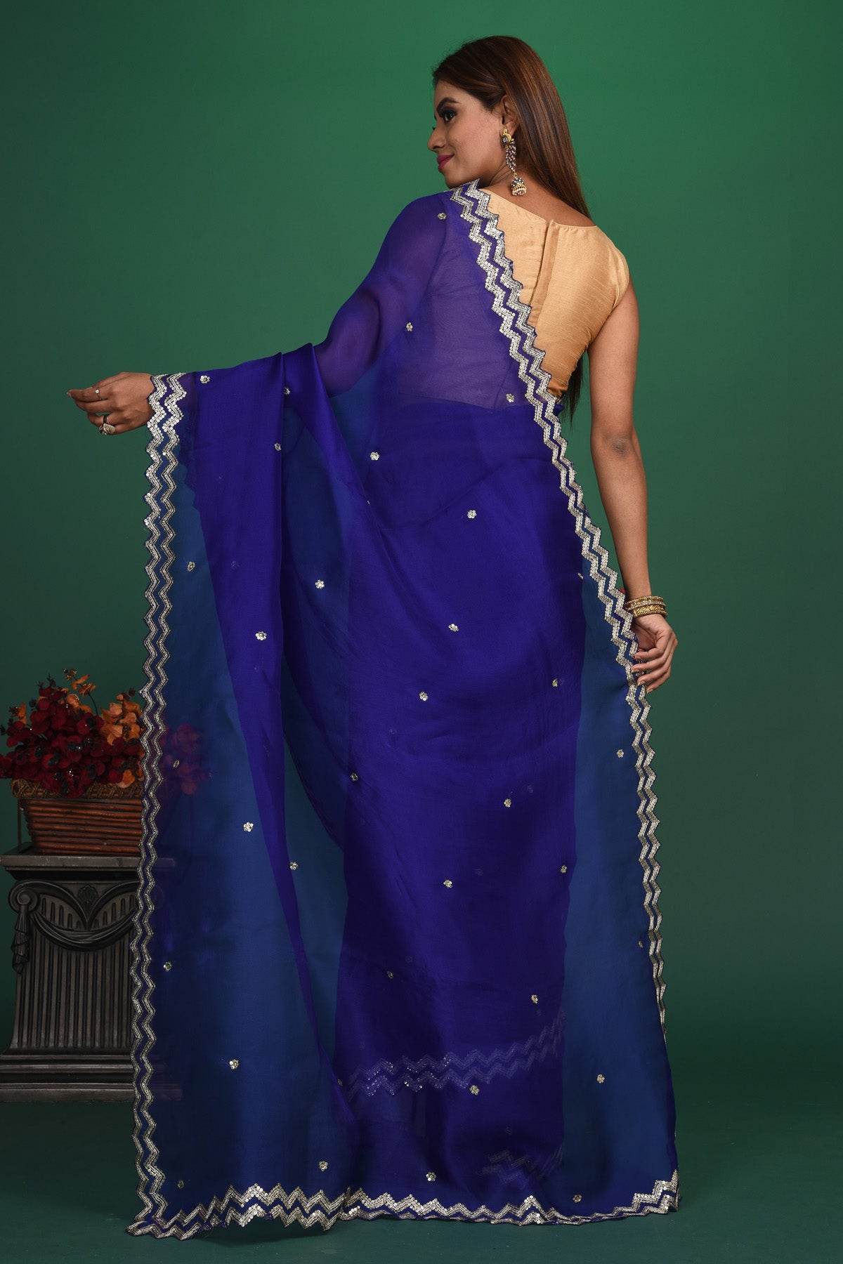 Buy beautiful royal blue embroidered organza saree online in USA. Be a vision of style and elegance at parties and special occasions in beautiful designer sarees, embroidered sarees, printed sarees, satin saris from Pure Elegance Indian fashion store in USA.-back