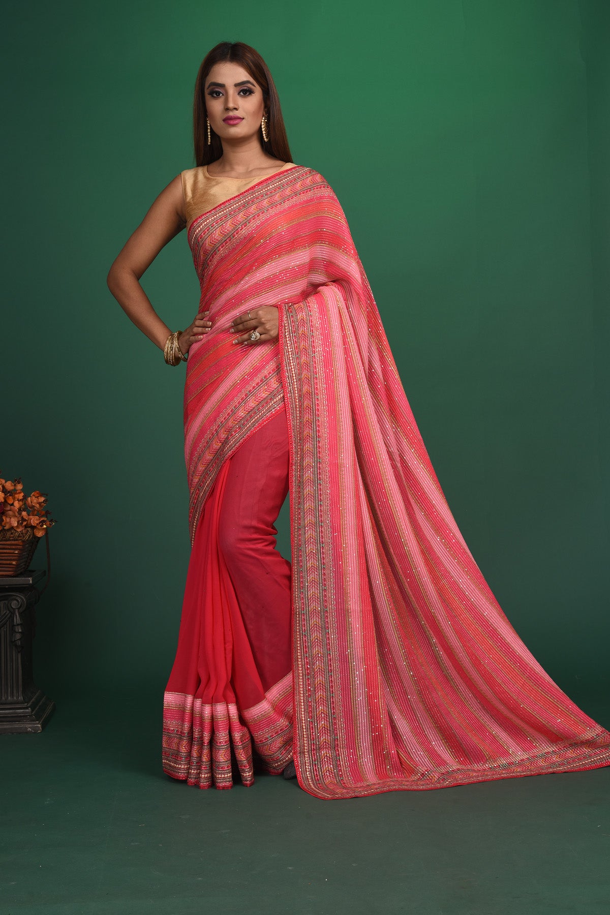 Shop stunning pink striped sequin georgette saree online in USA. Be a vision of style and elegance at parties and special occasions in beautiful designer sarees, embroidered sarees, printed sarees, satin saris from Pure Elegance Indian fashion store in USA.-full view
