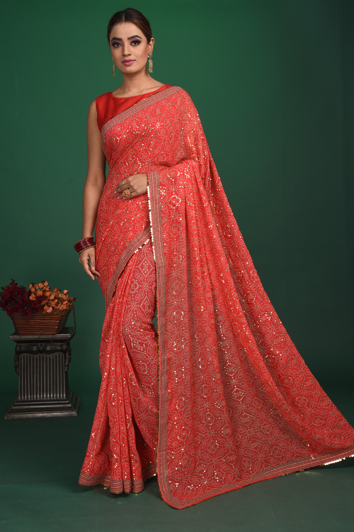 Shop stunning red bandhej and sequin georgette saree online in USA. Be a vision of style and elegance at parties and special occasions in beautiful designer sarees, embroidered sarees, printed sarees, satin saris from Pure Elegance Indian fashion store in USA.-full view