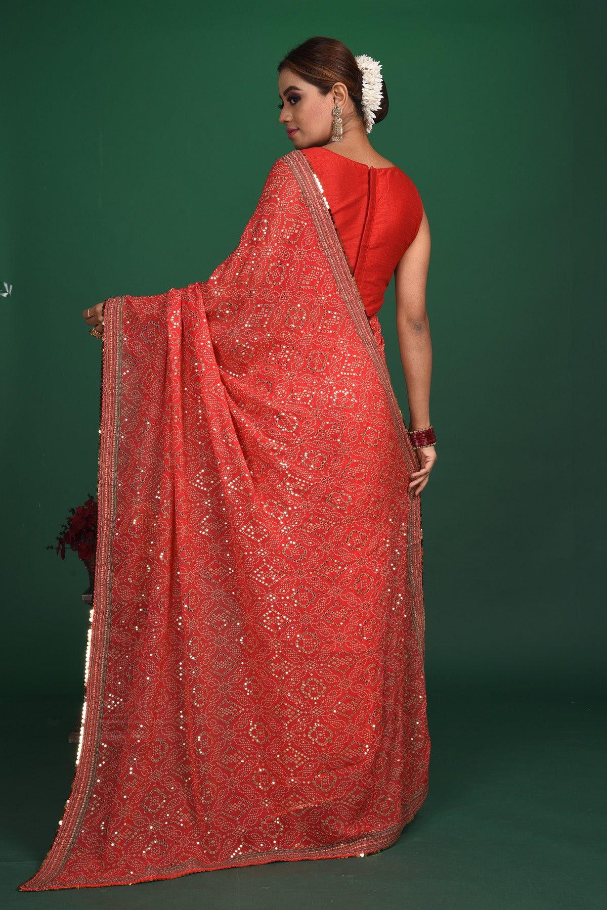 Shop stunning red bandhej and sequin georgette saree online in USA. Be a vision of style and elegance at parties and special occasions in beautiful designer sarees, embroidered sarees, printed sarees, satin saris from Pure Elegance Indian fashion store in USA.-back