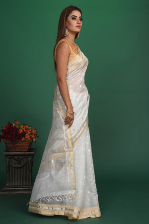 Shop beautiful white organza saree online in USA with pink embroidered blouse. Be a vision of style and elegance at parties and special occasions in beautiful designer sarees, embroidered sarees, printed sarees, satin saris from Pure Elegance Indian fashion store in USA.-side