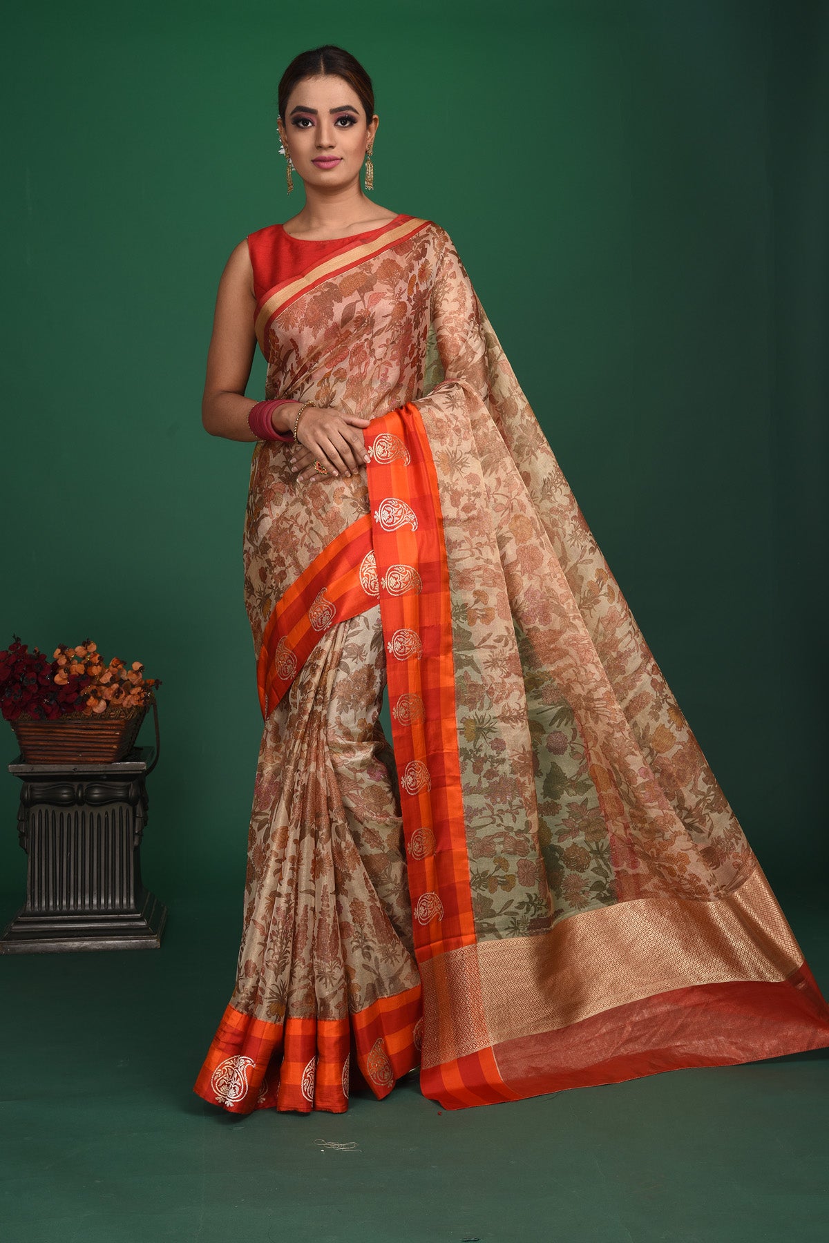 Buy beautiful beige printed Kanjeevaram saree online in USA with red and orange border. Be a vision of style and elegance at parties and special occasions in beautiful designer sarees, embroidered sarees, printed sarees, satin saris from Pure Elegance Indian fashion store in USA.-full view