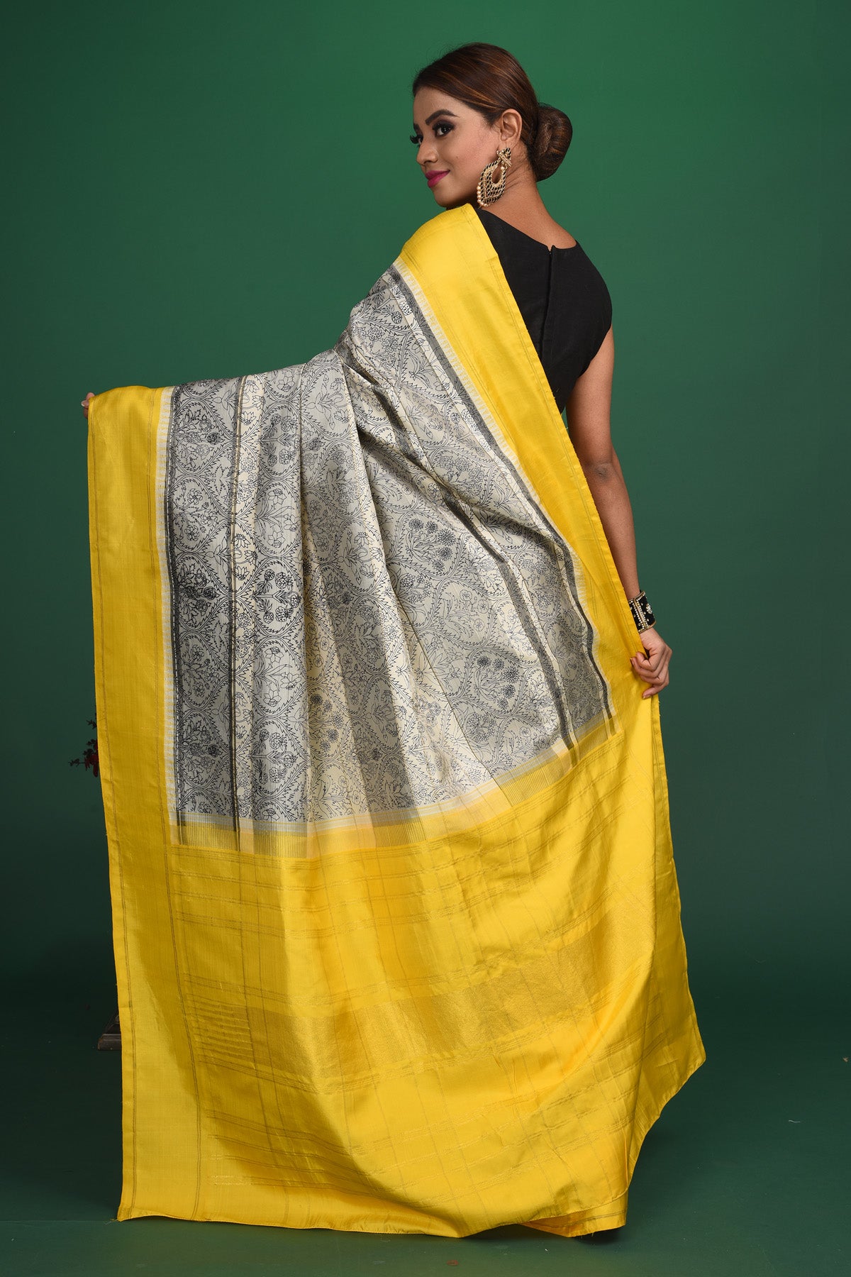Shop grey printed Kanjeevaram saree online in USA with yellow border. Be a vision of style and elegance at parties and special occasions in beautiful designer sarees, embroidered sarees, printed sarees, satin saris from Pure Elegance Indian fashion store in USA.-back