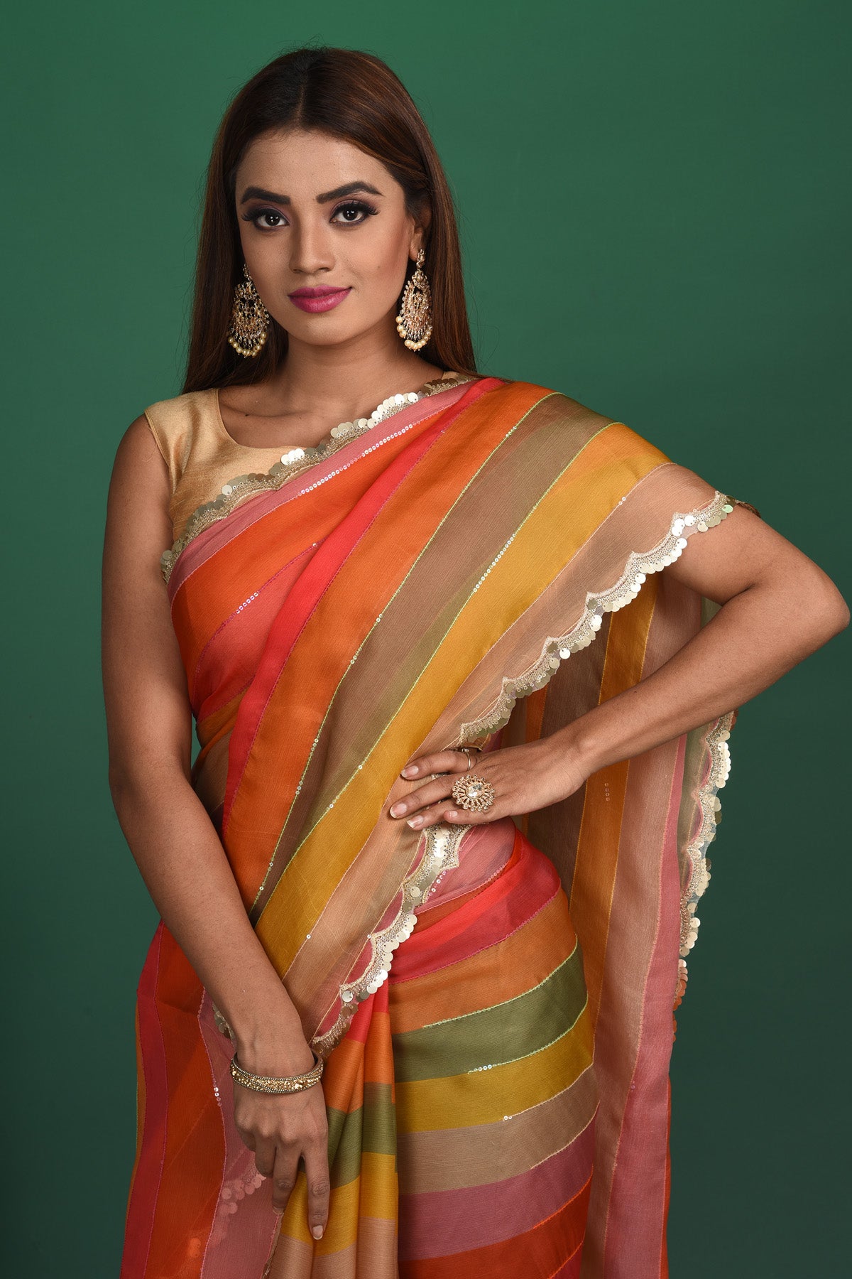 Shop multicolor stripes georgette sari online in USA with sequin scalloped border. Be a vision of style and elegance at parties and special occasions in beautiful designer sarees, embroidered sarees, printed sarees, satin saris from Pure Elegance Indian fashion store in USA.-closeup