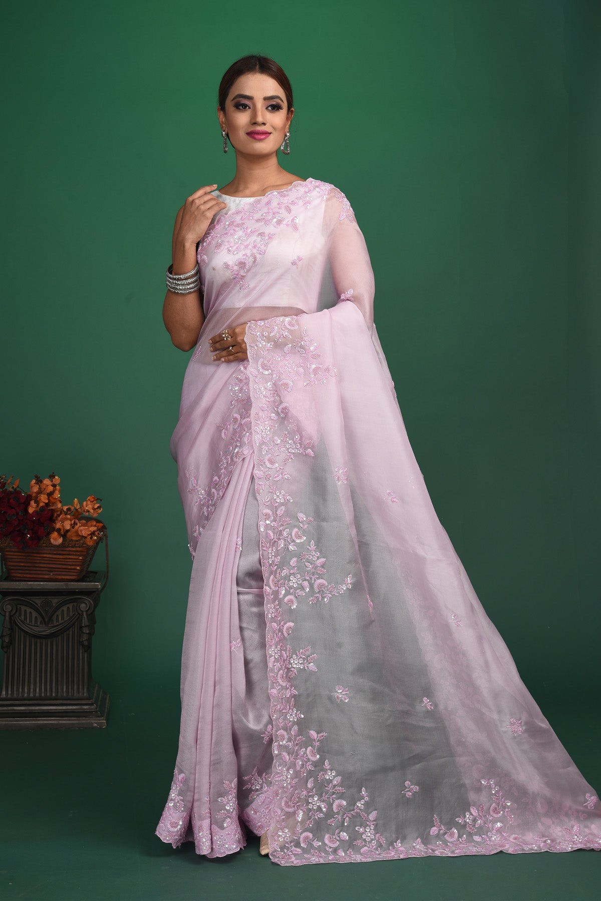 Shop stunning lavender organza sari online in USA with embroidered border. Be a vision of style and elegance at parties and special occasions in beautiful designer sarees, embroidered sarees, printed sarees, satin saris from Pure Elegance Indian fashion store in USA.-full view