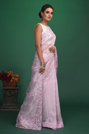Shop stunning lavender organza sari online in USA with embroidered border. Be a vision of style and elegance at parties and special occasions in beautiful designer sarees, embroidered sarees, printed sarees, satin saris from Pure Elegance Indian fashion store in USA.-side