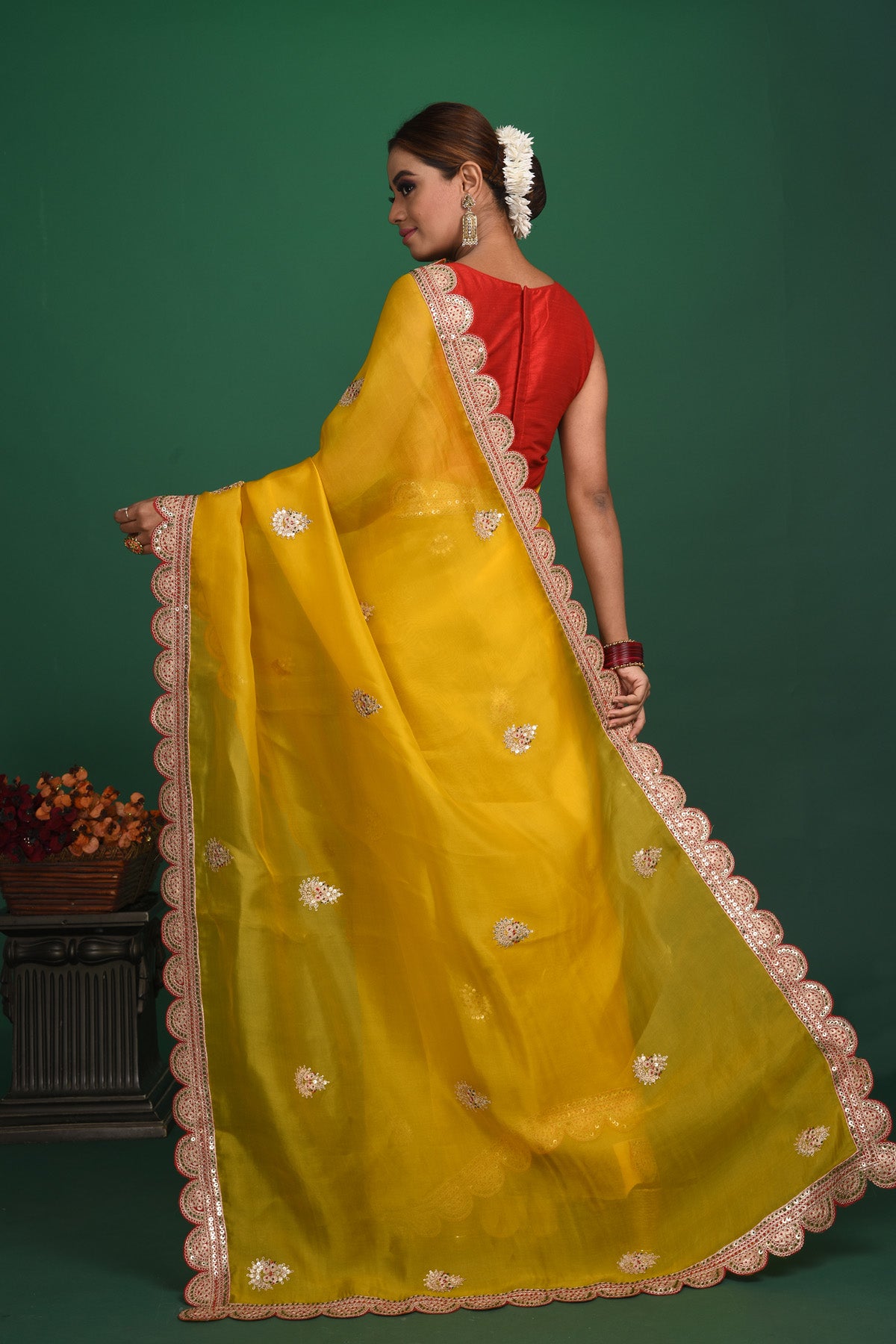 Shop stunning mango yellow embroidered organza saree online in USA. Be a vision of style and elegance at parties and special occasions in beautiful designer sarees, embroidered sarees, printed sarees, satin saris from Pure Elegance Indian fashion store in USA.-back