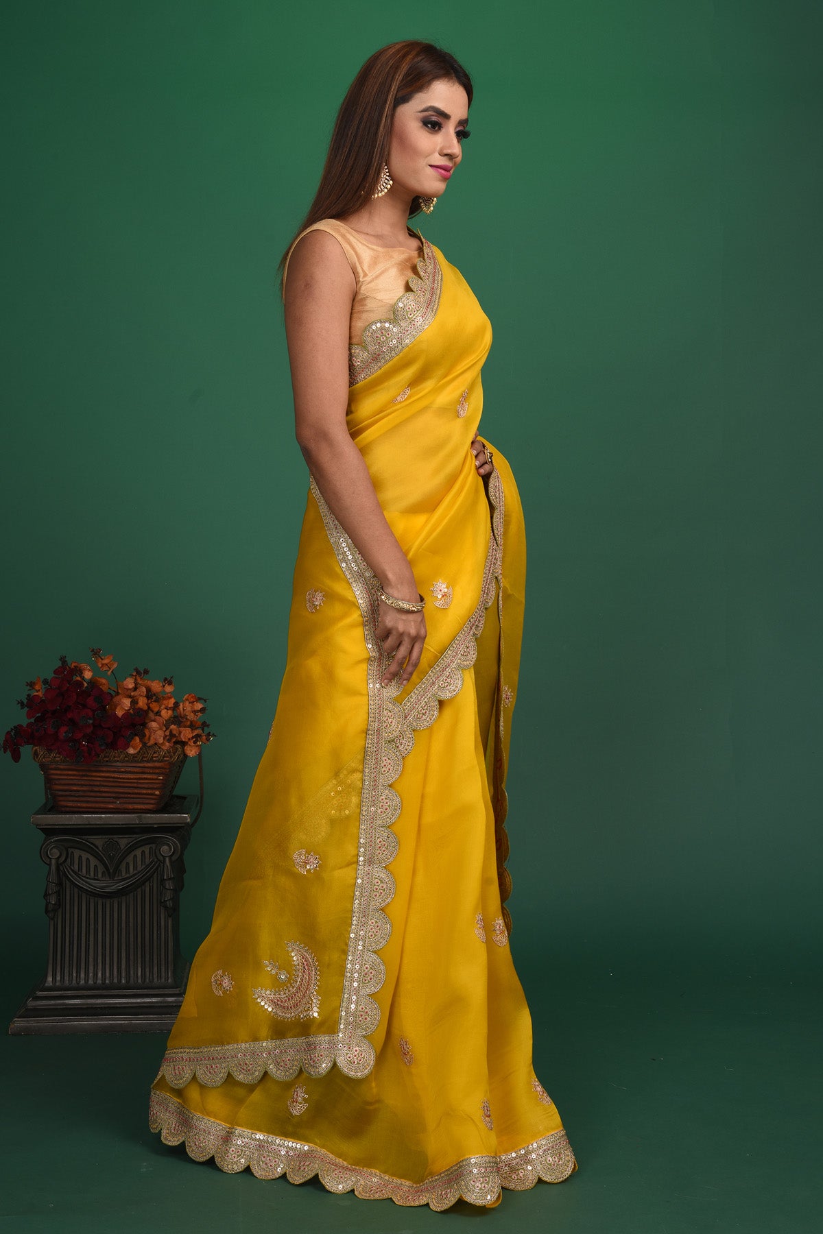 Buy stunning mango yellow embroidered organza saree online in USA. Be a vision of style and elegance at parties and special occasions in beautiful designer sarees, embroidered sarees, printed sarees, satin saris from Pure Elegance Indian fashion store in USA.-side