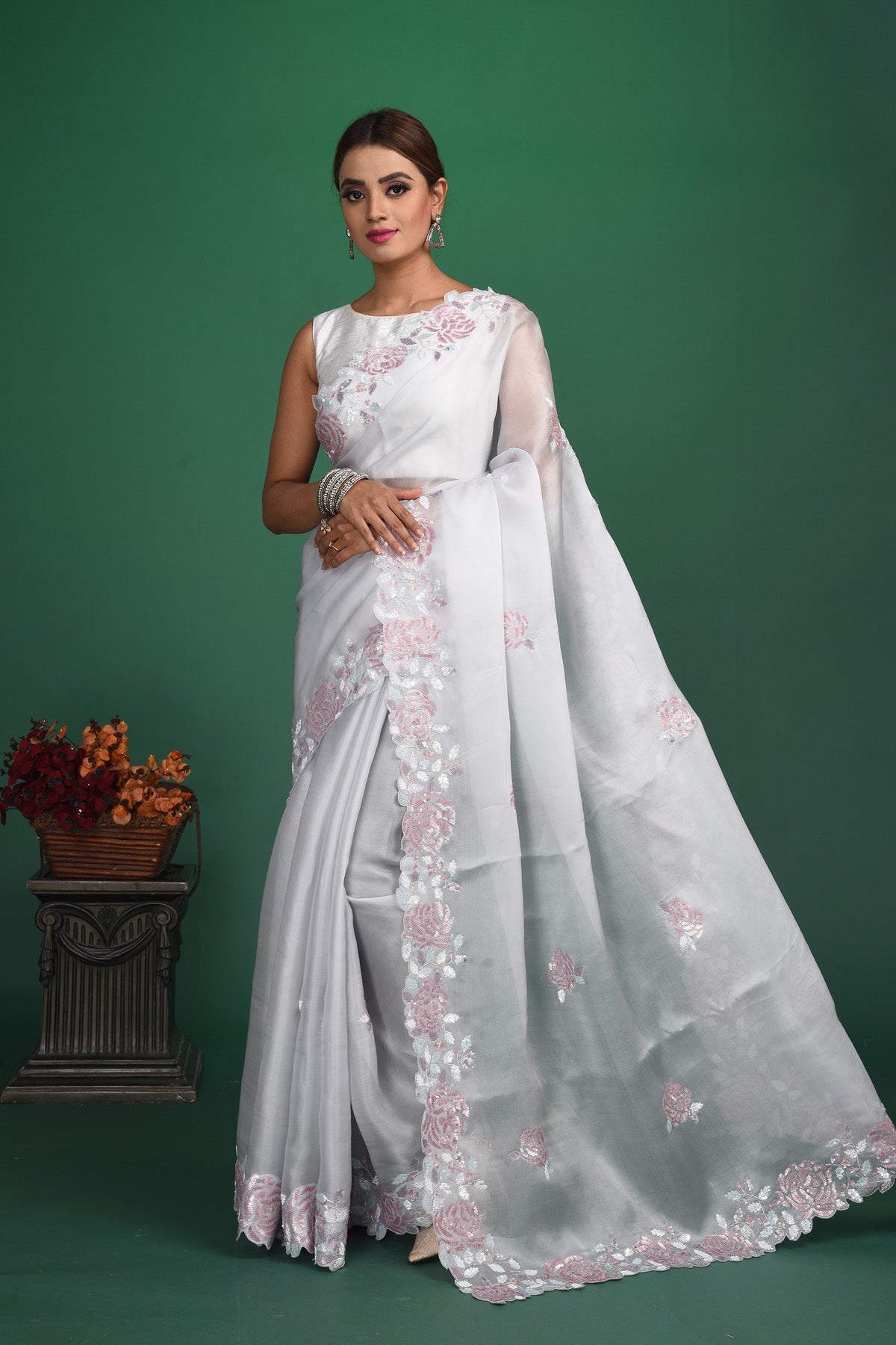 Buy stunning white embroidered organza saree online in USA. Be a vision of style and elegance at parties and special occasions in beautiful designer sarees, embroidered sarees, printed sarees, satin saris from Pure Elegance Indian fashion store in USA.-full view