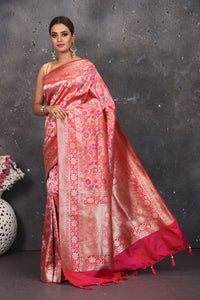 Buy this exquisite pink banarasi brocade with weaving dull-gold zari border online in USA. Create and establish a smashing influence on everybody by carrying this traditional Banarasi Brocade woven silk saree comes with colourful floral pattern with your designer blouse. Shop designer handwoven banarasi brocade sari with any blouse from Pure Elegance Indian saree store in USA.= Full view with folded hands.