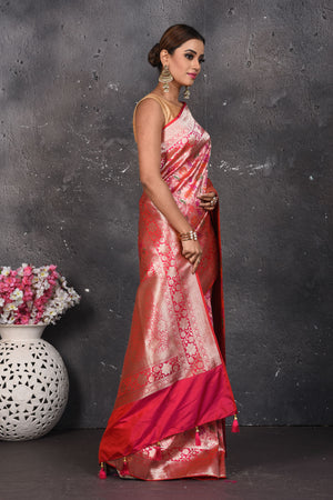 Buy this exquisite pink banarasi brocade with weaving dull-gold zari border online in USA. Create and establish a smashing influence on everybody by carrying this traditional Banarasi Brocade woven silk saree comes with colourful floral pattern with your designer blouse. Shop designer handwoven banarasi brocade sari with any blouse from Pure Elegance Indian saree store in USA.- Side view.