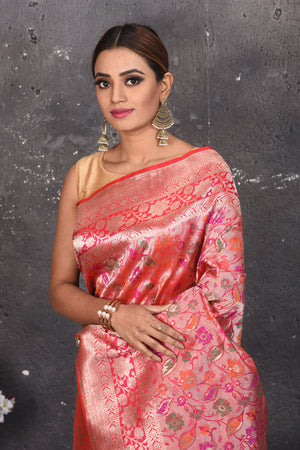 Buy this exquisite pink banarasi brocade with weaving dull-gold zari border online in USA. Create and establish a smashing influence on everybody by carrying this traditional Banarasi Brocade woven silk saree comes with colourful floral pattern with your designer blouse. Shop designer handwoven banarasi brocade sari with any blouse from Pure Elegance Indian saree store in USA.- Close up.