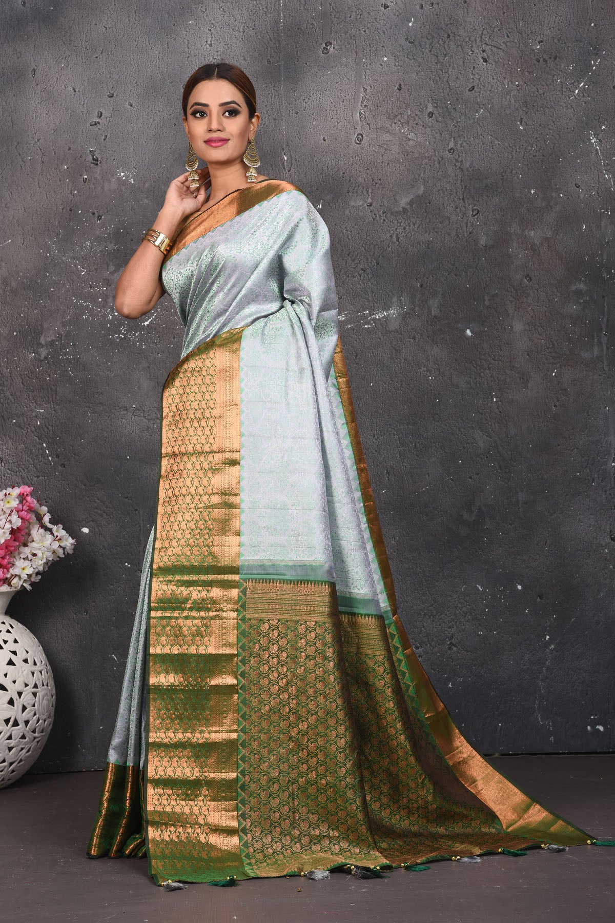 Buy beautiful handloom kanchipuram silk saree adorned with antique zari buta work online in USA which has crafted by skilled weaver with elegance and grace, this saree is definitely the epitome of beauty and a must have in your collection. Buy designer handwoven kanchipuram sari with any blouse from Pure Elegance Indian saree store in USA.- Full view.