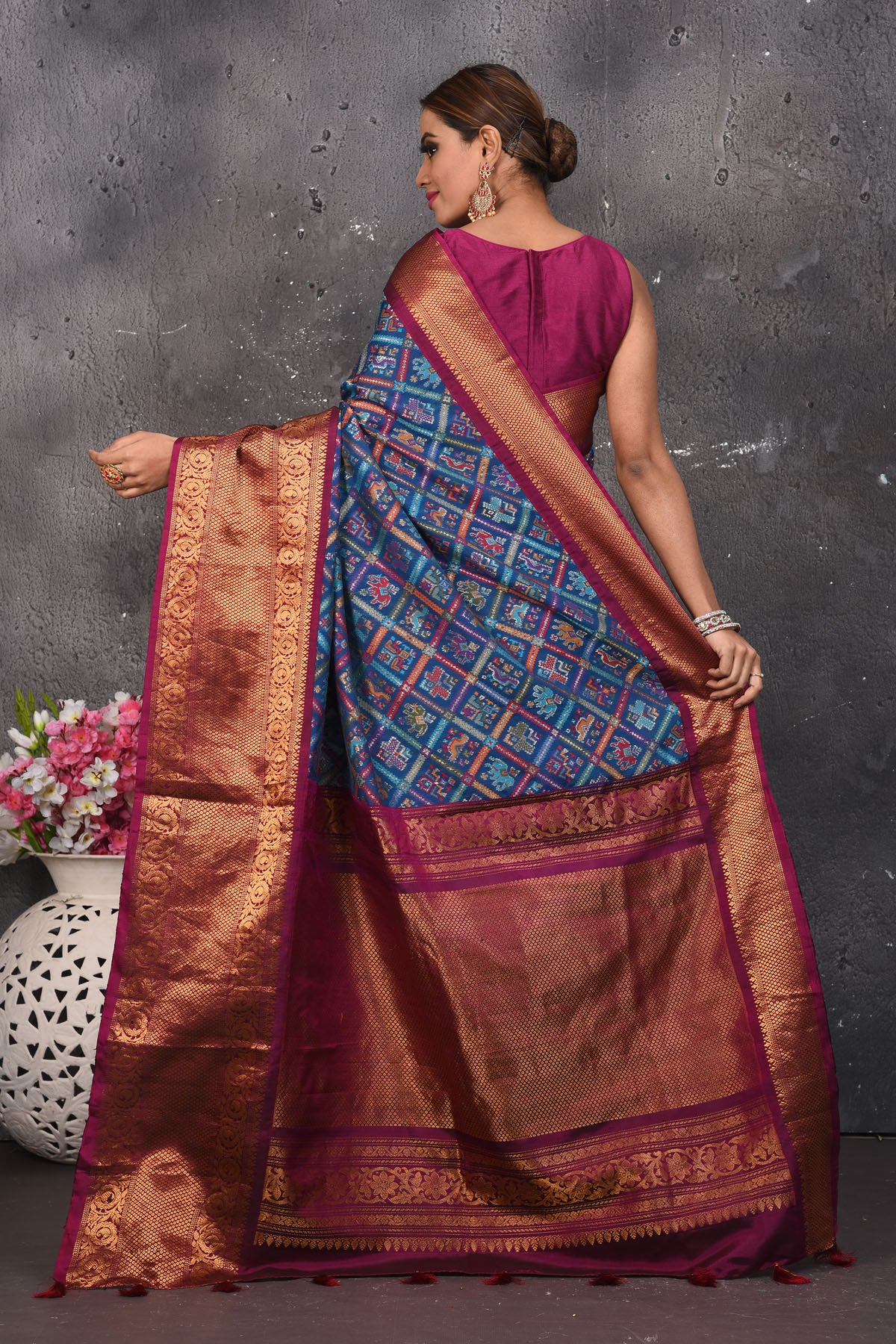 Buy this royal banarasi silk saree with pashmina weaving adorned with antique zari work online in USA which has crafted by skilled weaver of Banaras with elegance and grace, this saree is definitely the epitome of beauty and a must have in your collection. Buy designer handwoven banarasi pashmina sari with any blouse from Pure Elegance Indian saree store in USA.- Back view with open pallu.