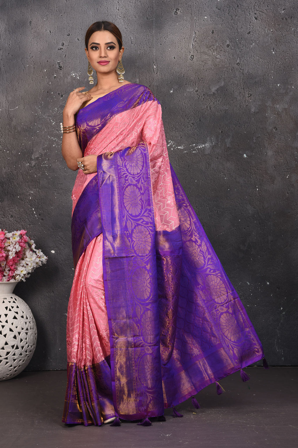 Buy this elegant purple and pink sequins georgette saree with heavy golden zari border online in USA. Create and establish a smashing influence on everybody by carrying this designer sequin georgette saree with your designer blouse. Shop designer sequins georgette with heavy border from Pure Elegance Indian saree store in USA.- Full view with open pallu.