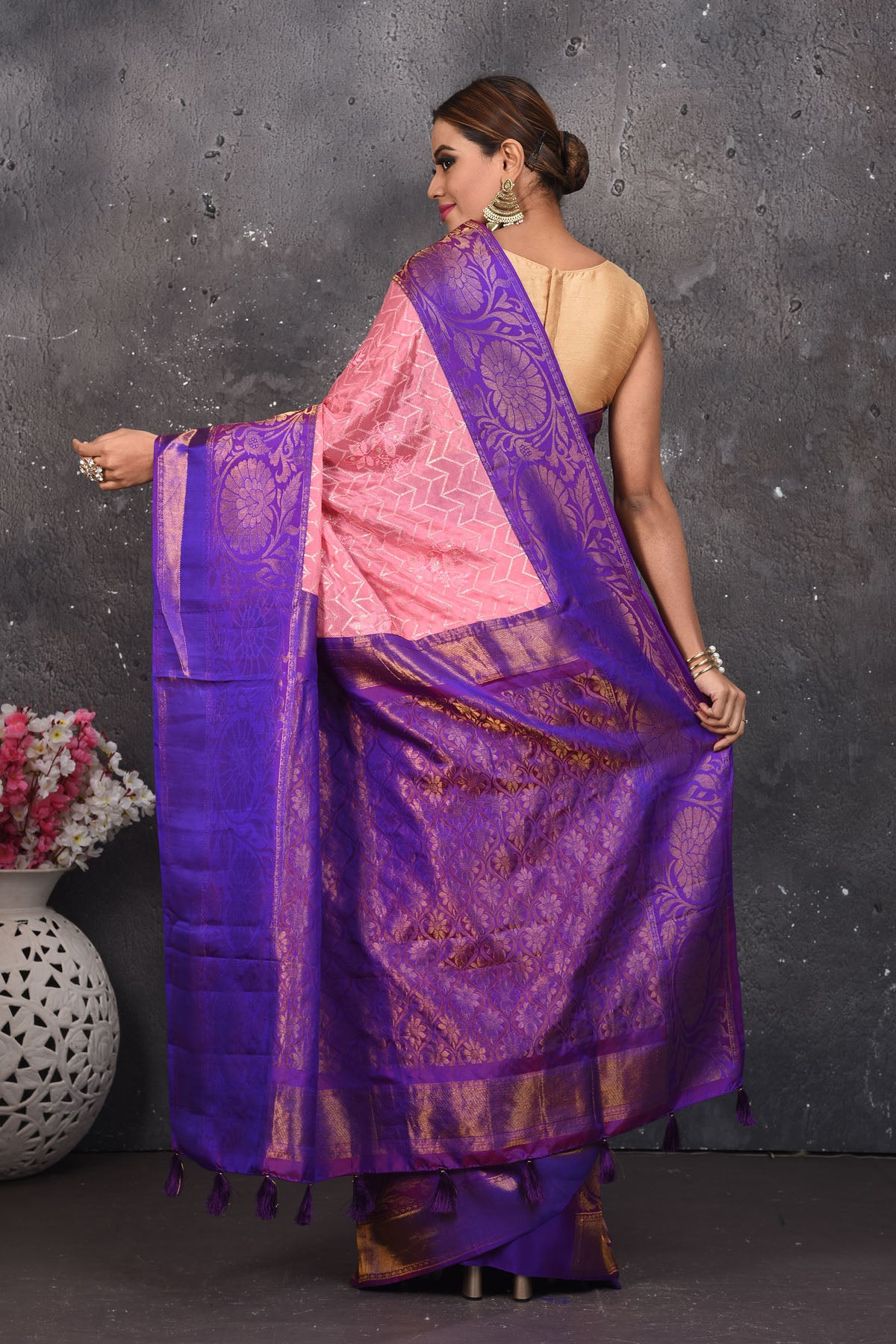 Buy this elegant purple and pink sequins georgette saree with heavy golden zari border online in USA. Create and establish a smashing influence on everybody by carrying this designer sequin georgette saree with your designer blouse. Shop designer sequins georgette with heavy border from Pure Elegance Indian saree store in USA.- Back view with open pallu.