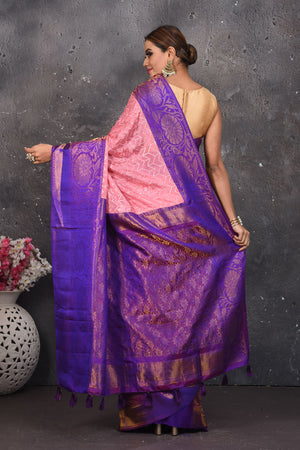 Buy this elegant purple and pink sequins georgette saree with heavy golden zari border online in USA. Create and establish a smashing influence on everybody by carrying this designer sequin georgette saree with your designer blouse. Shop designer sequins georgette with heavy border from Pure Elegance Indian saree store in USA.- Back view with open pallu.