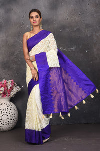 Buy this exquisite Off-white and violet chiffon box printed saree with chikankari hand-embroidered online in USA. Style this lucknawi sari with a potli bag and high heels for a flawless look which has gorgeous heavy pallu with dull-gold zari work. This saree is definitely the epitome of beauty and a must have in your collection. Buy designer handwoven chikankari sari with any blouse from Pure Elegance Indian saree store in USA.- Full view.