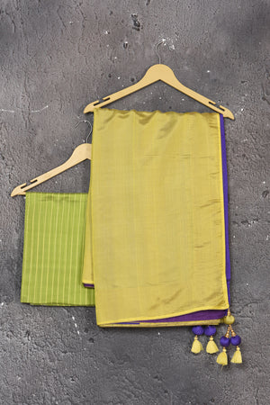 Shop stunning yellow and blue striped matka silk saree online in USA. Keep your ethnic wardrobe up to date with latest designer sarees, pure silk sarees, Kanchipuram silk sarees, handwoven saris, tussar silk sarees, embroidered saris from Pure Elegance Indian saree store in USA.-blouse