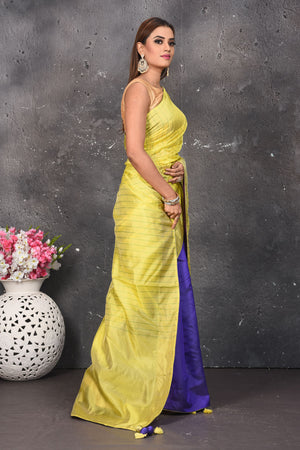 Shop stunning yellow and blue striped matka silk saree online in USA. Keep your ethnic wardrobe up to date with latest designer sarees, pure silk sarees, Kanchipuram silk sarees, handwoven saris, tussar silk sarees, embroidered saris from Pure Elegance Indian saree store in USA.-side