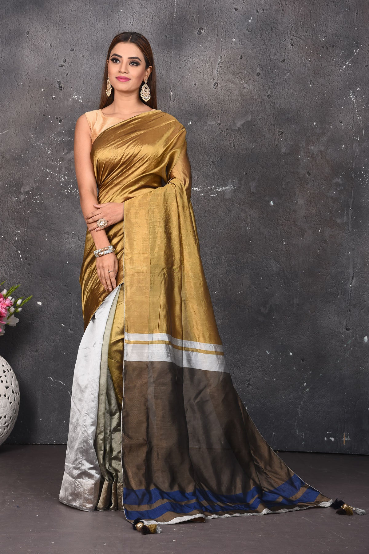 Shop stunning golden and silver matka silk saree online in USA. Keep your ethnic wardrobe up to date with latest designer sarees, pure silk sarees, Kanchipuram silk sarees, handwoven saris, tussar silk sarees, embroidered saris from Pure Elegance Indian saree store in USA.-full view