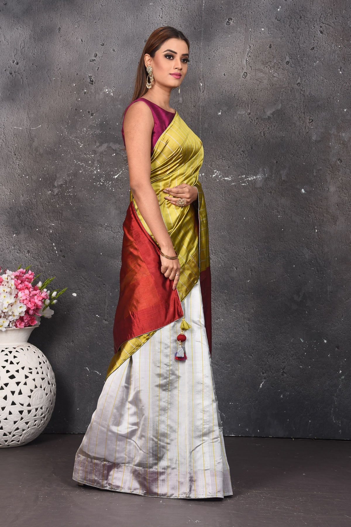 Shop stunning gold and grey matka silk saree online in USA with red pallu. Keep your ethnic wardrobe up to date with latest designer sarees, pure silk sarees, Kanchipuram silk sarees, handwoven saris, tussar silk sarees, embroidered saris from Pure Elegance Indian saree store in USA.-side